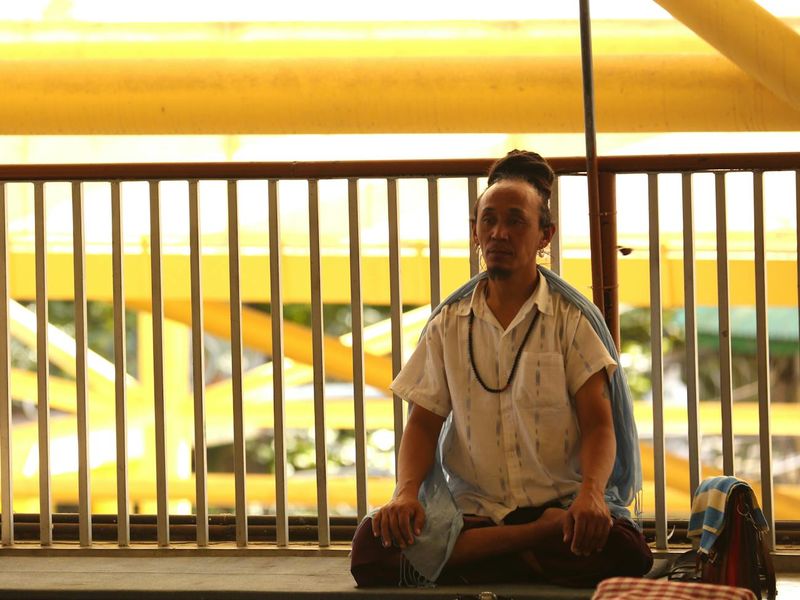 Person practicing meditation and focus outdoors